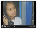 Woman on payphone