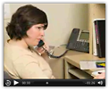 Woman on office phone